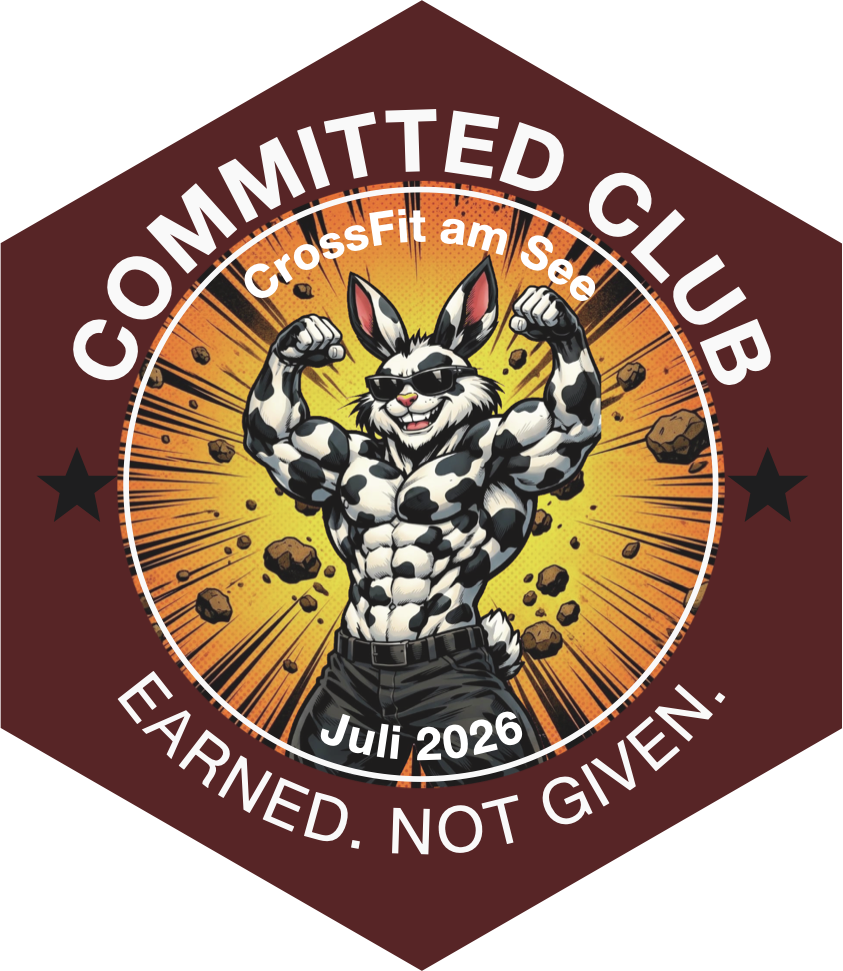 Committed-Club-Abzeichen Juli 2026: muskulöser Hase im Kuhfell-Muster spannt die Arme an